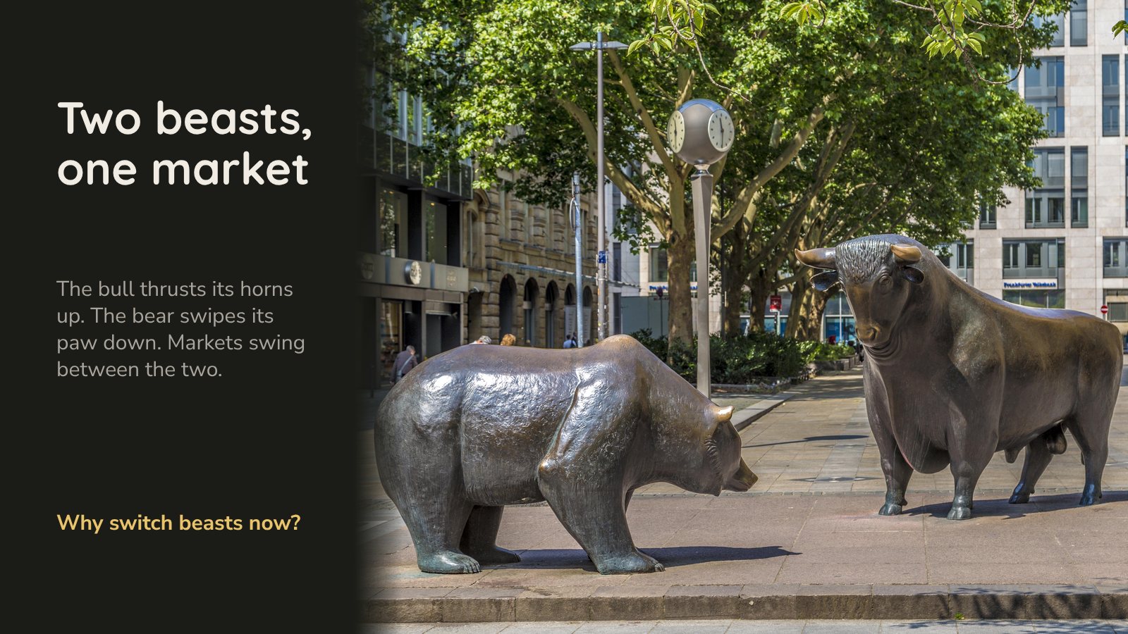 Photo of two bronze statues facing each other on a paved city square under plane trees: a bear on all fours, head lowered, and a bull standing square with its horns up.